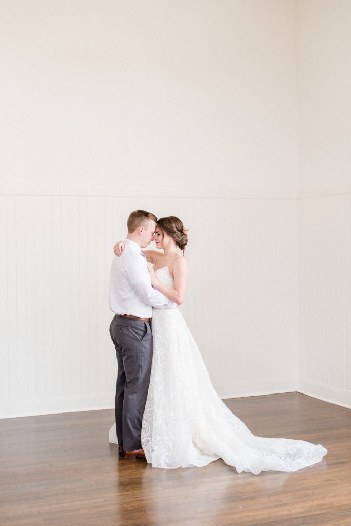 pretty in pink styled shoot bride and groom portrait