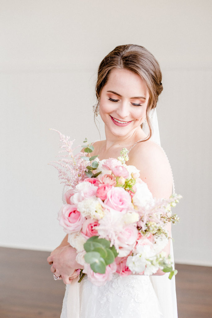 bride with pink bouquet