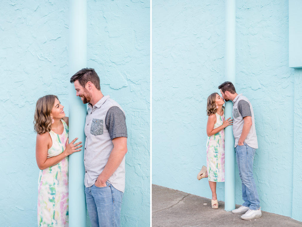 couple in front of blue wall