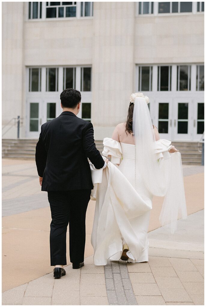 bride and groom walking in okc